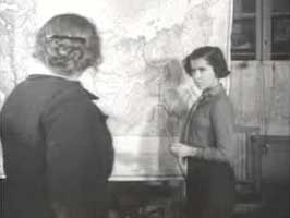 child at a chalkboard