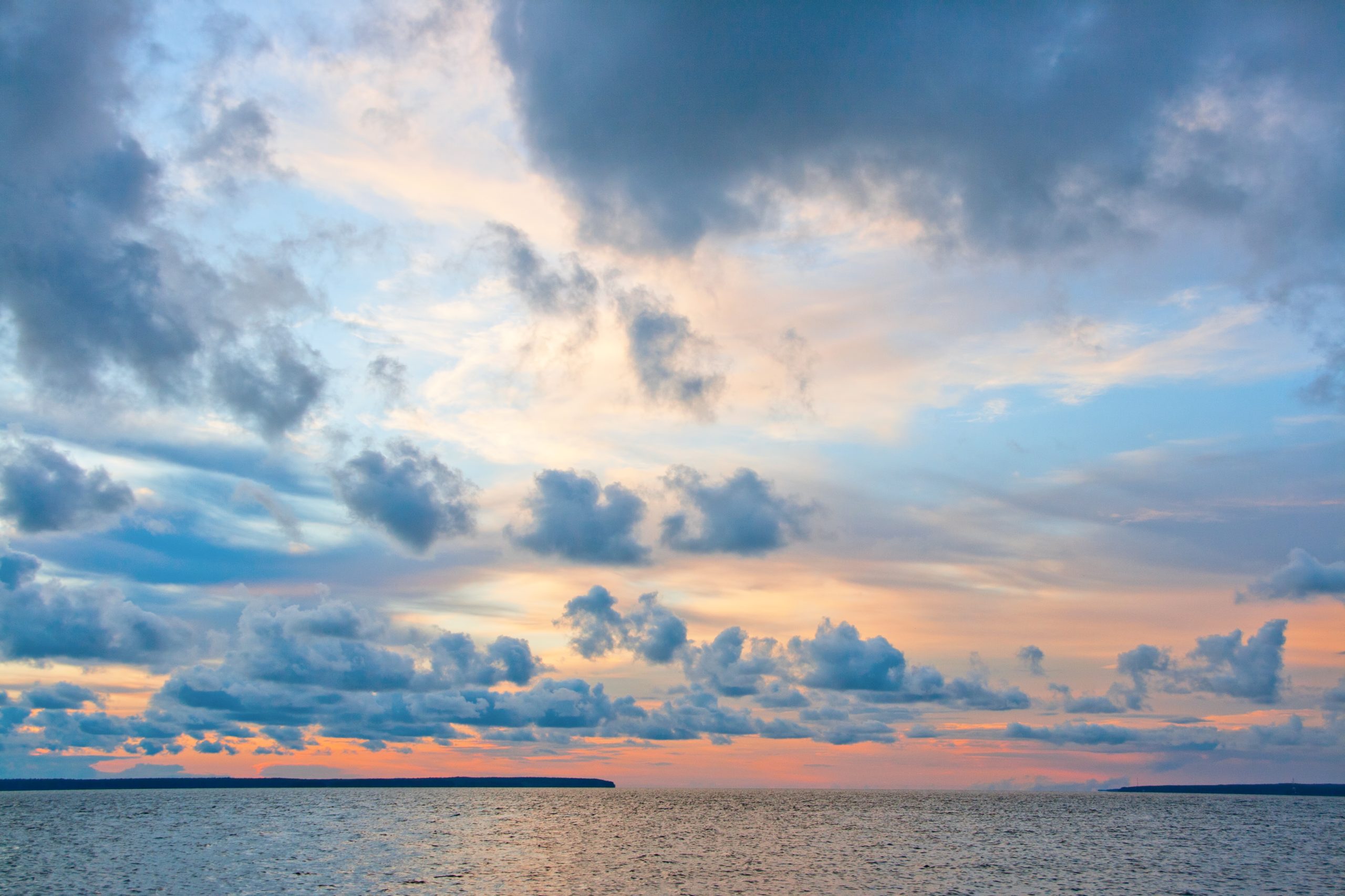 the Baltic Sea at sunset with clouds